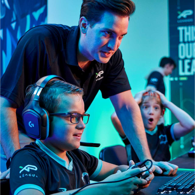 xp league instructor assisting a gamer