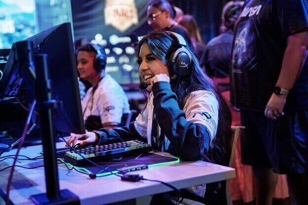 teen gamer competes from a professional gaming station