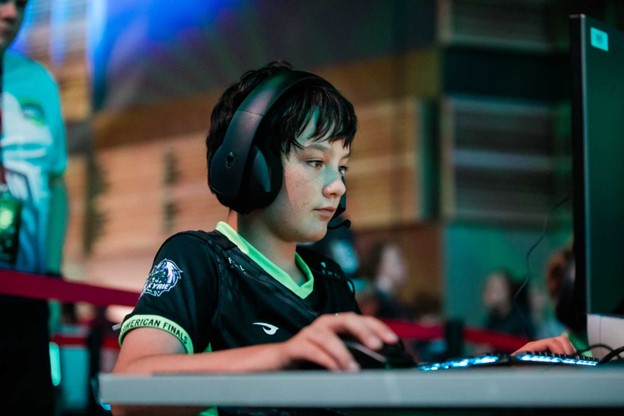 young gamer enjoys a professional gaming station